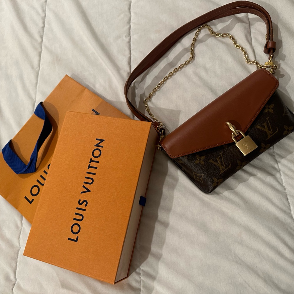 Louis Vuitton padlock on strap
